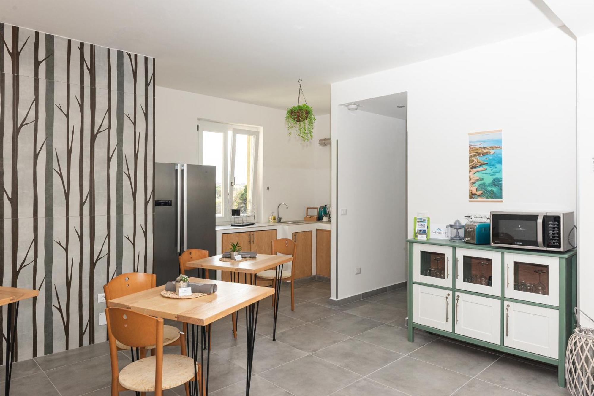 Guest House - Affittacamere Green Apartment - By Faendho Porto Torres Exterior photo