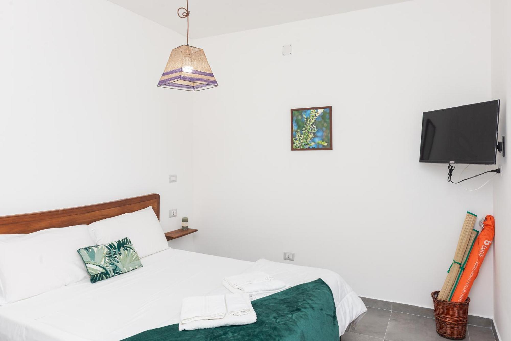 Guest House - Affittacamere Green Apartment - By Faendho Porto Torres Exterior photo
