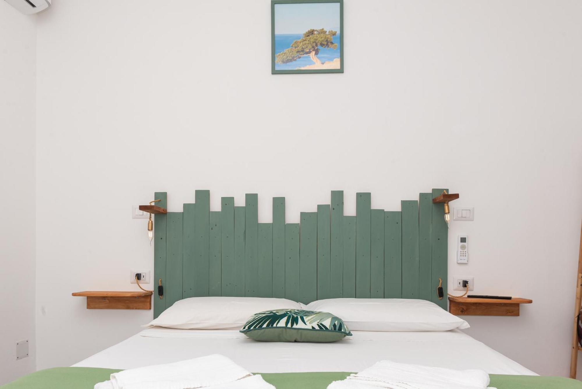 Guest House - Affittacamere Green Apartment - By Faendho Porto Torres Exterior photo